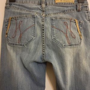 Soft light colored jeans. Size 2.